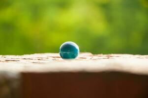 Blue paintball sphere photo