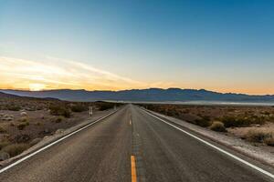 Sunset in the death valley highway photo