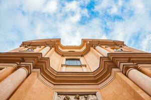 Bottom up view of an ancient cathedral photo