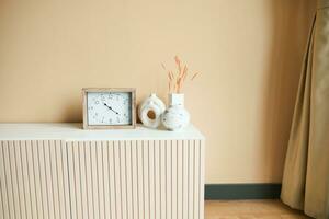 simple modern clock on table photo