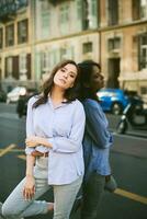 Outdoor portrait of young asian woman leaning on mirror wall, street fashion photo