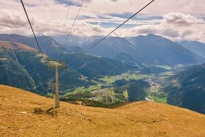 Panoramic view of alpine mountain valley, Bellwald, Valais, Switzerland photo