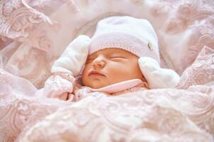 Close up portrait of adorable sleeping newborn baby girl photo