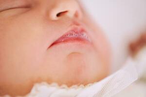 Close up image of newborn baby face photo