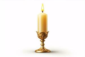 A vintage candle burning in a golden candelabrum is solitary on a white background. photo