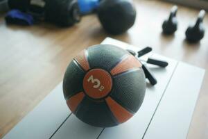 Gym Equipment or Dumbbell Kettlebell in a gym bench photo