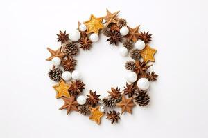 A festive Christmas wreath lies atop a pristine white surface in an aerial view, providing ample blank space. photo