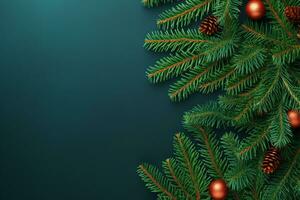 A postcard with red and green decorations against a blue background, depicting a festive winter New Year scene, composed from fir tree branches with a top-down view. photo