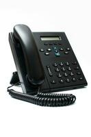 Black deskphone on the white background photo