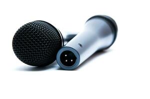 Black microphone on a white background photo