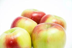 Five fresh apples on a white background photo