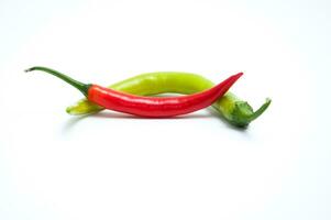 Red and green chili peppers on a white background photo