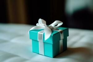 AI generated a small blue gift box with a silver ribbon photo