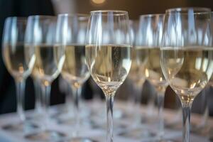 AI generated many glasses of champagne are lined up on a table photo