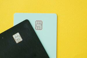 close up of credit cards on yellow background photo