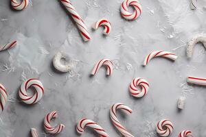 AI generated many candy canes are scattered on a white surface photo