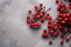 ai generado rojo bayas en un gris antecedentes foto