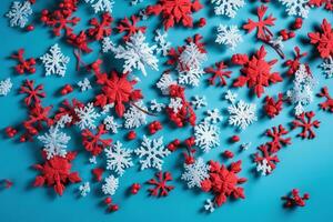 ai generado un grande grupo de rojo y blanco copos de nieve en un azul antecedentes foto