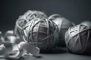 AI generated three balls of yarn with ribbon around them photo