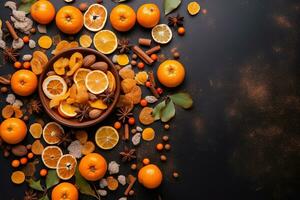 orange and cinnamon on a black background photo