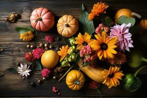 autumn flowers on wooden background photo