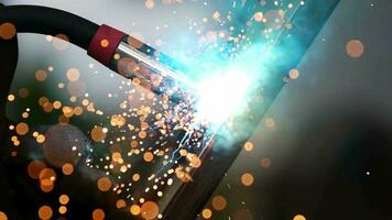 Welding sparks, slow motion. A worker uses a welding machine. Metal welder working with arc welding machine to weld steel at factory while wearing safety equipment. video