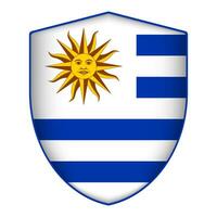Uruguay flag in shield shape. Vector illustration.