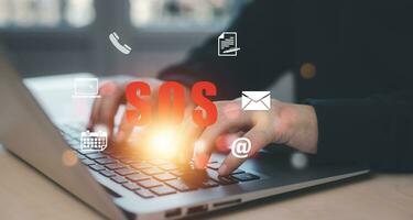 SOS with Emergency app concept, Business people using a laptop and touch bar Emergency app at home, call phone, Chat message icon, Emergency application from smartphone for elderly, call for help photo