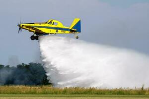 Special mission plane at air base. Air force flight operation. Aviation and aircraft. Firefighting and firekiller. Military industry. Fly and flying. photo