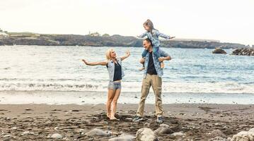 happy family with child daughter girl by the sea, spring photo