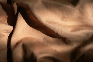 Brown textile background. Fabric texture. photo