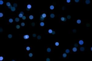 azul redondo borroso bokeh luces para un festivo antecedentes. desenfocado imagen foto