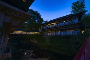 An old fashioned architecture in Nakanojo Gunma at dusk wide shot photo