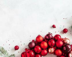 Christmas composition. Fir tree branches, red decorations on gray background, Flowers composition. White and purple flowers on marble background, Eucalyptus leaves, winter, top view. Christmas gift. photo