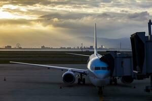 passenger plane preparing for departure from osaka airport japan photo