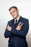 Portrait of handsome man in black blue suit photo