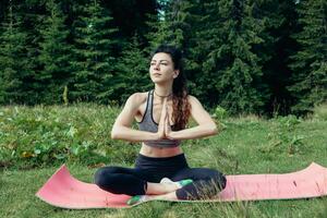 Healthy young independent female yoga practitioner photo