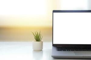 Laptop on the table on the background of the window. photo