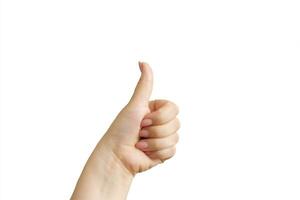 Female hand isolated on white background. Thumbs up photo