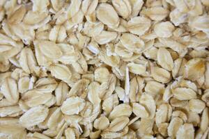 Oatmeal texture. Ingredients for cooking. Healthy grooming photo