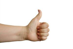 Female hand isolated on white background. Thumbs up photo