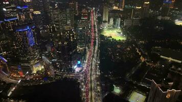 Semanggi, Jakarta, 2023 - - Antenne Drohne Aussicht ofjakarta Nacht mit Stadtbild Himmel Scrapper und Gebäude genommen mit fallen Nieder Bewegung während Aufschlussreich das Stadt Aussicht video