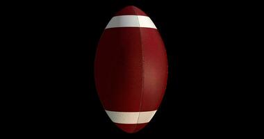 American Football Ball rotating on alpha background. Seamless loop. video