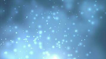 bianca raggiante particelle su reale blu sfondo. luccichio particelle e brillante particelle sfondo video
