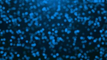 Beautiful Royal blue glitter particles falling and flickering particles over Royal blue background, simple particles background video