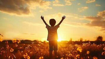 Little boy raising hands over sunset sky, enjoying life and nature. Happy Kid on summer field looking on sun. Generative AI photo
