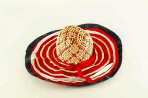 a straw hat with red, white and blue stripes photo