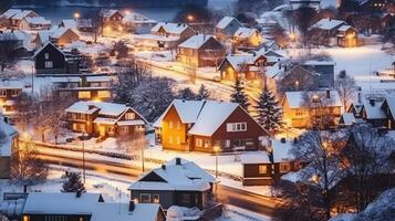 alto ángulo ver de exterior residencial casas situado en Nevado calles de moderno ciudad con brillante luces en invierno tiempo. generativo ai foto