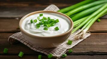 Fresh Sour Cream with Green Onions Served in a Bowl on a Wooden Background. Generative AI photo