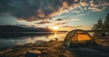 A tent pitched by the lake offers breathtaking views of the sunrise or sunset. Generative AI photo